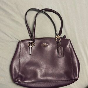 Beautiful plum Coach small/medium size hand bag
